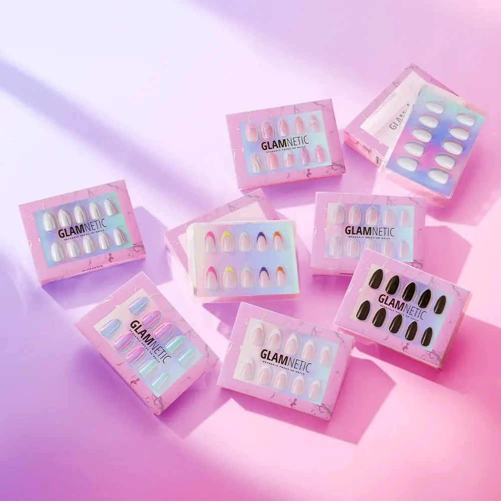 The first Glamnetic press-on nail sets on a pink and lilac background, August 2020
